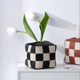Checkered Tissue Box Cover on Bathroom Counter